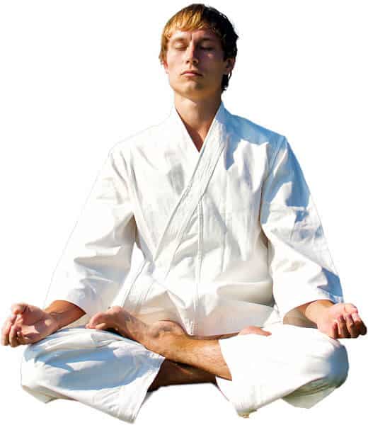 Martial Arts Lessons for Adults in San Antonio TX - Young Man Thinking and Meditating in White